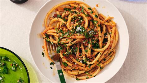 Using a fork, move the spaghetti strands until evenly coated, pressing the spaghetti to distribute the broth until it evenly coats the pasta. . Nyt recipes